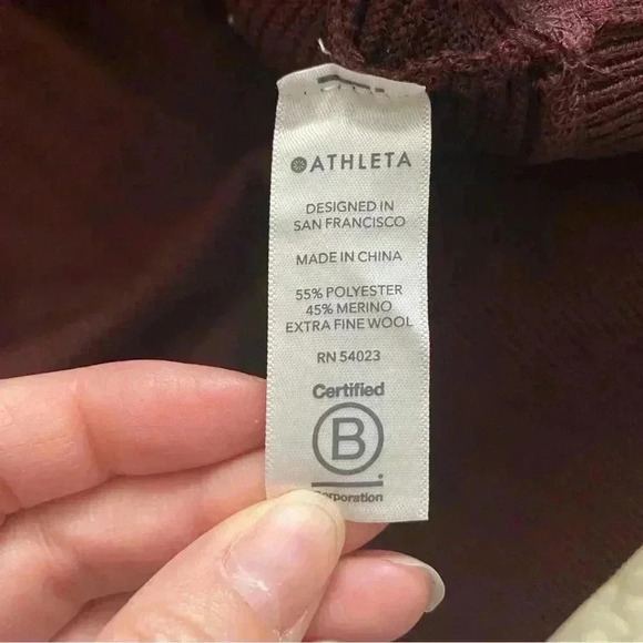 Size m Athleta Burgundy sweater with stripes on the sleeves. - Picture 5 of 6